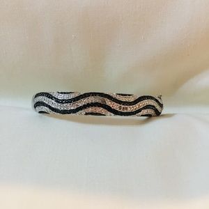 SILVER TONE BANGLE BRACELET WITH CRYSTALS